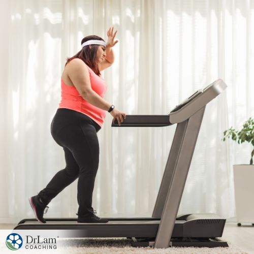 An image of a woman using the treadmill
