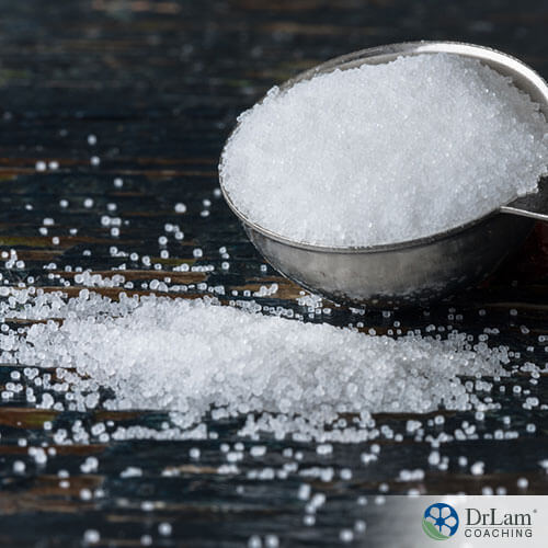An image of iodized salt in a measuring spoon