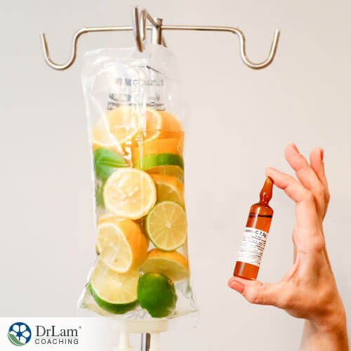 An image of an IV bag full of fluid and slices of citrus fruit