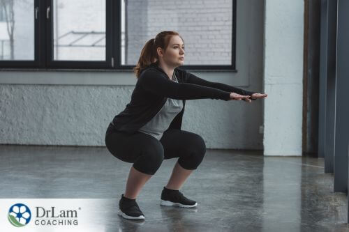 An image of an exercising woman