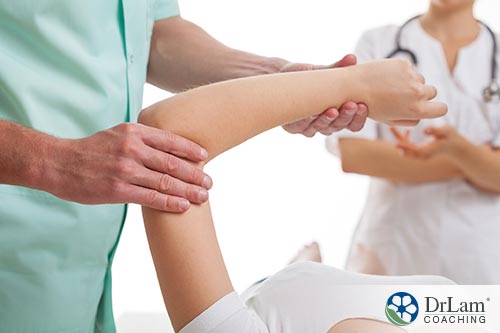 An image of a doctor examining a patient's joint pain