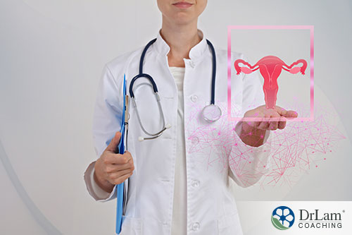 Doctor holding an image of vagina as representation of good care