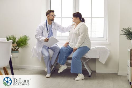 An image of a woman consulting a doctor