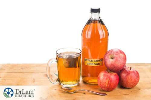 An image of apples and apple cider vinegar
