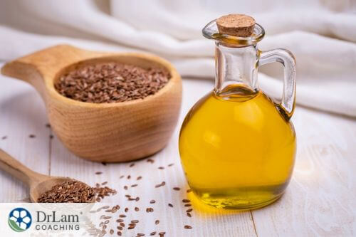 An image of flaxseed oil and flaxseeds