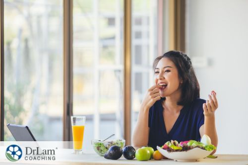 An image of a woman eating healthy foods