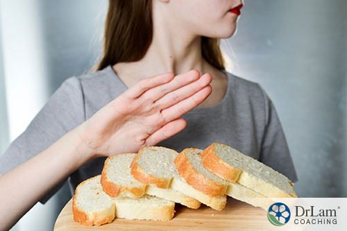 An image of a woman refusing to take bread