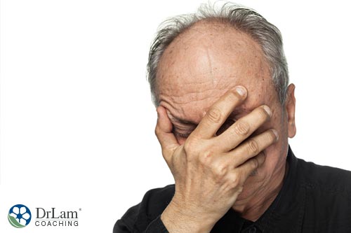 An image of an older man who is frustrated by the symptoms of post finasteride syndrome