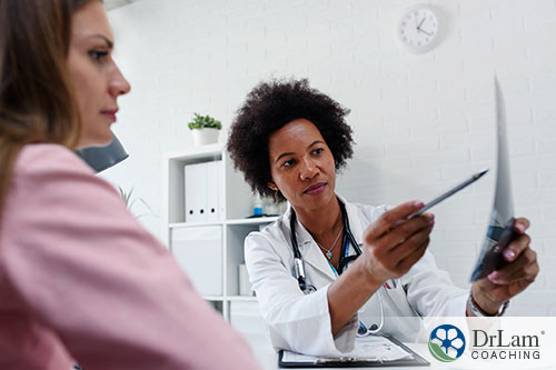 An image of a doctor explaining something to her patient