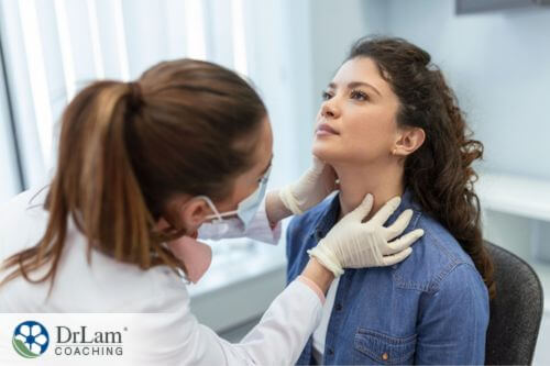 An image of a woman being examined by her doctor