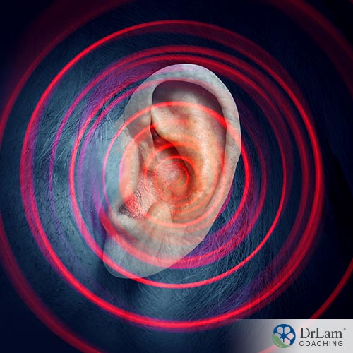 An image of a ear with soundwaves
