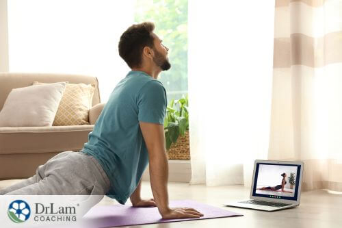 An image of a man doing a yoga pose