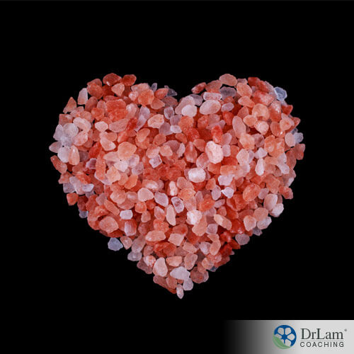 An image of pink Himalayan salt in the shape of a heart, salt and high blood pressure have been linked for years