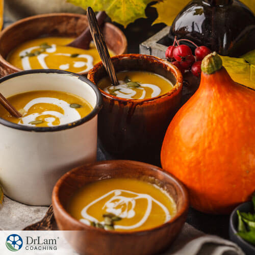 An image of fresh seasonal pumpkin soup in mugs