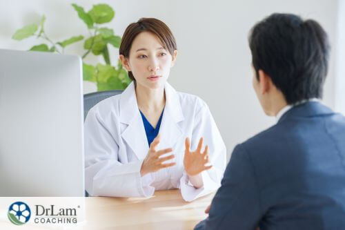 An image of a man talking with his healthcare practitioner