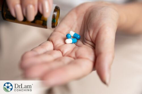 An image of pills in someones hand
