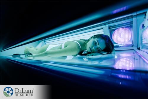 Woman lying in Solarium as sunscreen