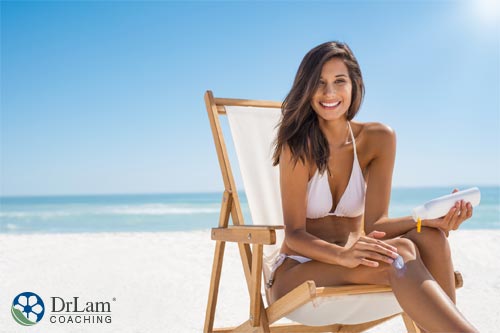 Woman Applying sunscreen and Sunscreen Risk