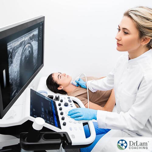 An image of a woman having a thyroid ultrasound