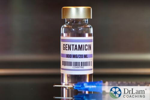 An image of a vial containing gentamicin with a syringe